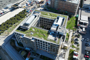  Blick auf die Toni Park Gebäude A (im ­Vordergrund) und B/C im Bau dahinter  