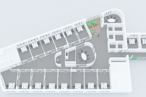  Die neuen Büroräume liegen entlang der Ost-/und Westfassade. Durch die gläsernen Durchgangswände fällt viel Tageslicht in die ­Geschossmitte – hier befinden sich jeweils Besprechungsräume.  